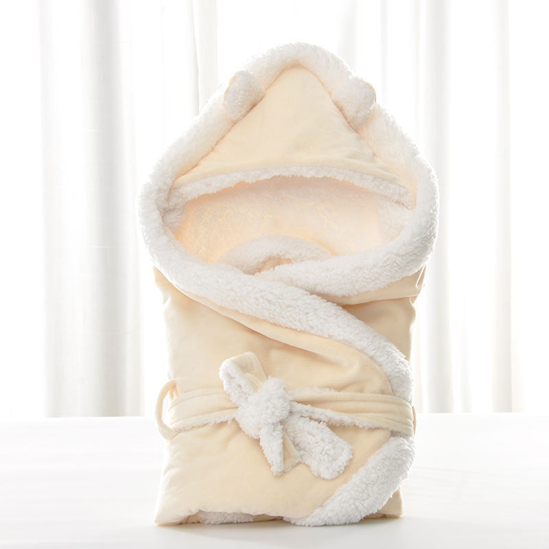 Newborn baby being hugged and swaddled by baby - Health and Wellness Innovations