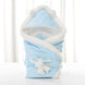 Newborn baby being hugged and swaddled by baby - Health and Wellness Innovations